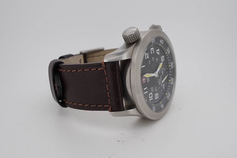 A gentleman's recent stainless steel Victorinox Swiss Army stainless steel manual wind wrist watch with black Arabic dial and subsidiary seconds, case diameter 45mm, on a brown leather strap, no box or papers.